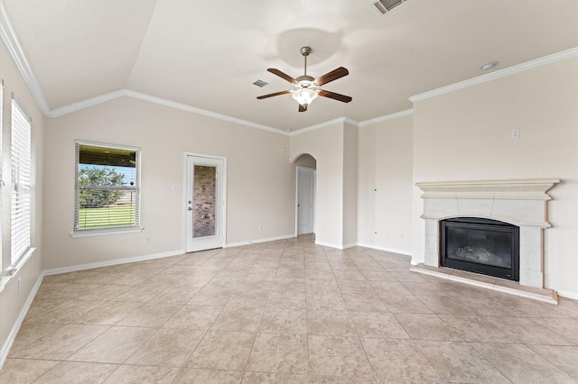 2043 Plum Rose Ln, Richmond, TX 77469 - unfurnished living room with ceiling fan, arched walkways, healthy amount of natural light, crown molding, and a tile fireplace