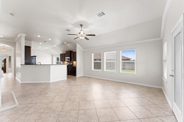 2043 Plum Rose Ln, Richmond, TX 77469 - unfurnished living room featuring light tile patterned floors, ceiling fan, ornamental molding, lofted ceiling, and baseboards