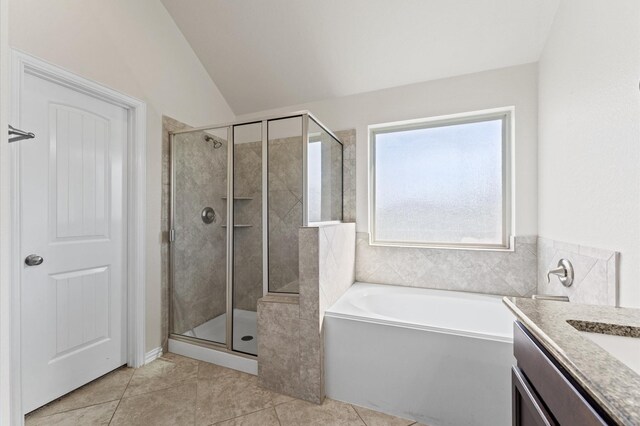 2043 Plum Rose Ln, Richmond, TX 77469 - full bath with a stall shower, a bath, tile patterned flooring, vanity, and lofted ceiling