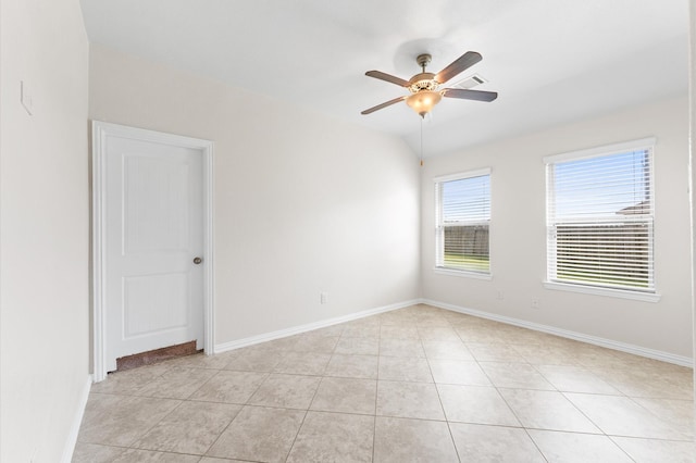 2043 Plum Rose Ln, Richmond, TX 77469 - empty room with a ceiling fan, light tile patterned floors, and baseboards