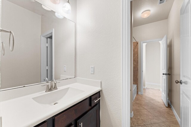 2043 Plum Rose Ln, Richmond, TX 77469 - bathroom featuring tile patterned flooring, vanity, and shower / washtub combination