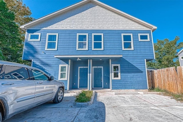view of front of house with fence