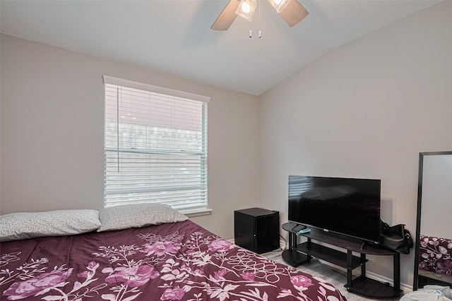 19942 Mountain Dale Dr, Cypress, TX 77433 - bedroom featuring wood finished floors, lofted ceiling, a ceiling fan, and baseboards