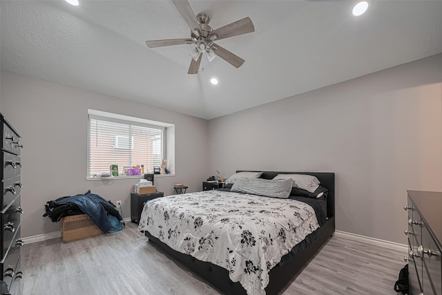 19942 Mountain Dale Dr, Cypress, TX 77433 - bedroom with baseboards, light wood finished floors, recessed lighting, and a ceiling fan