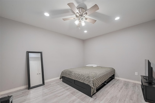 19942 Mountain Dale Dr, Cypress, TX 77433 - bedroom featuring light wood finished floors, baseboards, a ceiling fan, and recessed lighting
