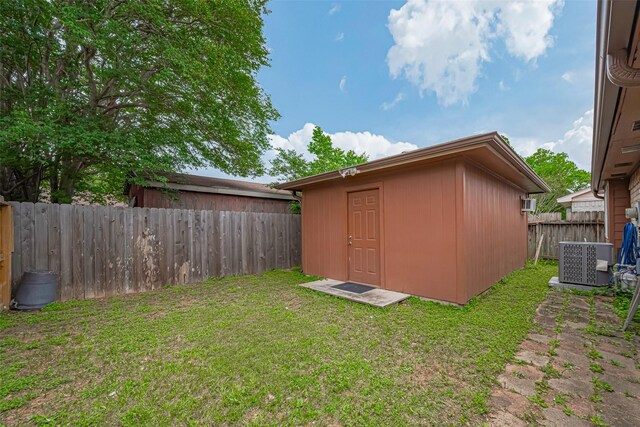 19942 Mountain Dale Dr, Cypress, TX 77433 - view of shed featuring central AC unit