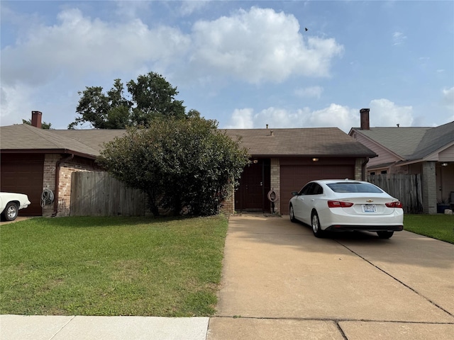 ranch-style house featuring a garage, concrete driveway, and brick siding