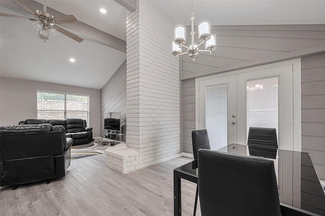 19942 Mountain Dale Dr, Cypress, TX 77433 - dining area with a chandelier, french doors, high vaulted ceiling, a ceiling fan, and wood finished floors