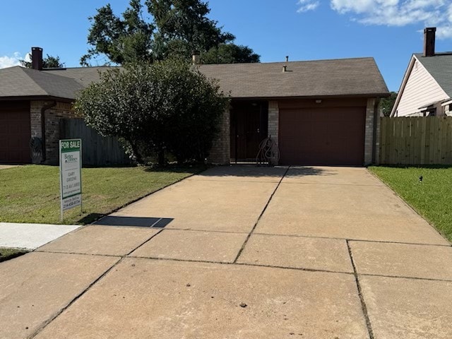 19942 Mountain Dale Dr, Cypress, TX 77433 - ranch-style home featuring concrete driveway, brick siding, and an attached garage