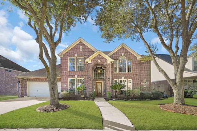 6334 Goodlowe Park, Sugar Land, TX 77479 - traditional-style home featuring brick siding, a front yard, a garage, and concrete driveway