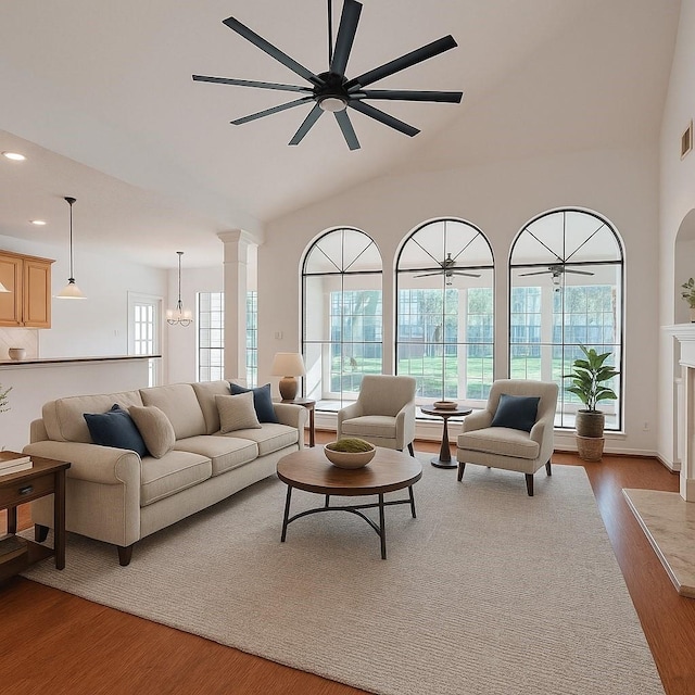 6334 Goodlowe Park, Sugar Land, TX 77479 - living area featuring dark wood-type flooring, ceiling fan, recessed lighting, and high vaulted ceiling