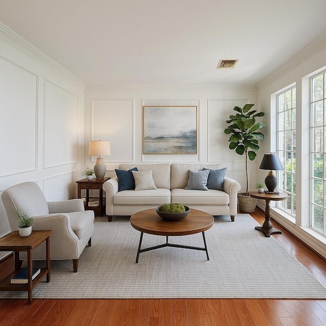 6334 Goodlowe Park, Sugar Land, TX 77479 - living area with a decorative wall, crown molding, and wood finished floors