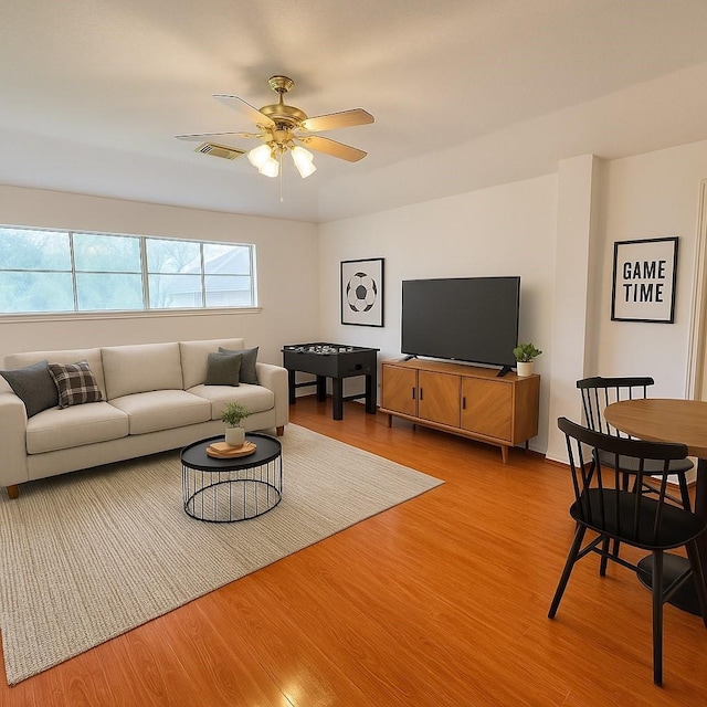6334 Goodlowe Park, Sugar Land, TX 77479 - living area with wood finished floors and a ceiling fan