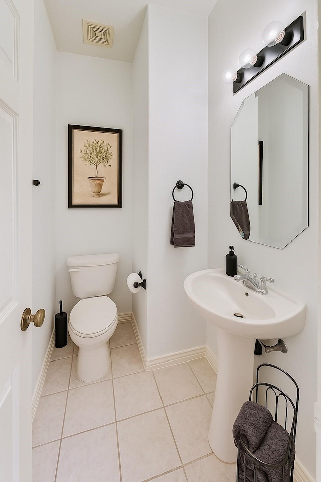 6334 Goodlowe Park, Sugar Land, TX 77479 - half bath with toilet, baseboards, and tile patterned floors