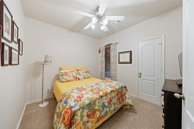 12909 Victoria Regina Dr, Montgomery, TX 77356 - carpeted bedroom featuring baseboards and ceiling fan