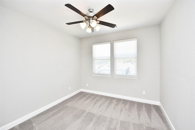 5502 Camaguey St, Houston, TX 77023 - unfurnished room featuring baseboards, a ceiling fan, and carpet