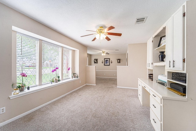 1618 Monroe Dr, Deer Park, TX 77536 - kitchen featuring a ceiling fan, open shelves, baseboards, light colored carpet, and white cabinets