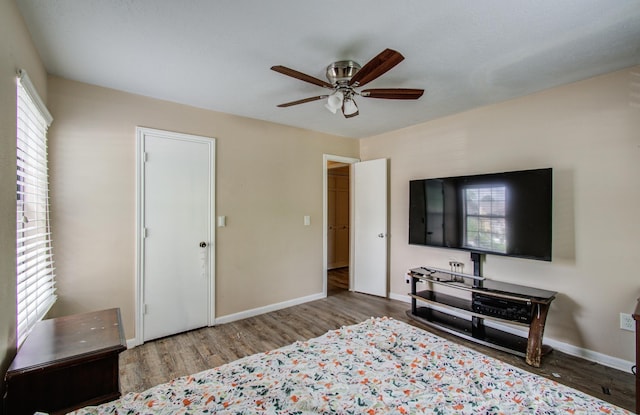 2915 Quailwood St, Houston, TX 77014 - bedroom with wood finished floors, baseboards, and a ceiling fan