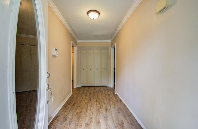 2915 Quailwood St, Houston, TX 77014 - hallway with baseboards, light wood-style floors, and crown molding