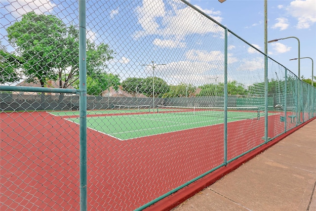 12915 Birch Falls Rd, Houston, TX 77065 - view of tennis court featuring fence