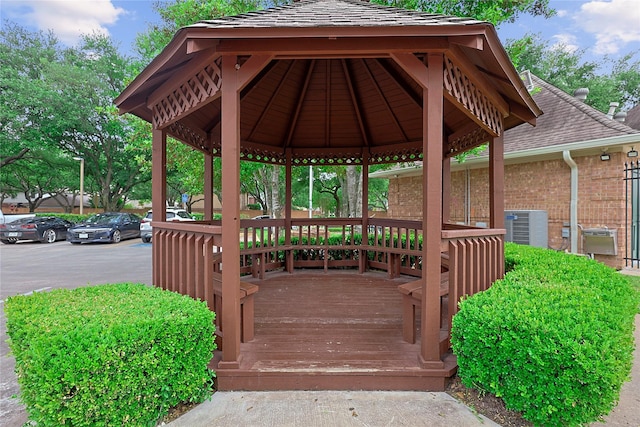12915 Birch Falls Rd, Houston, TX 77065 - wooden deck featuring a gazebo and central AC