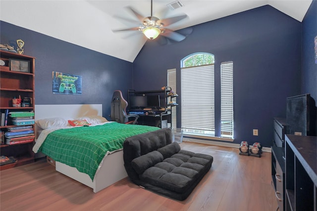 12915 Birch Falls Rd, Houston, TX 77065 - bedroom featuring vaulted ceiling, wood finished floors, and a ceiling fan