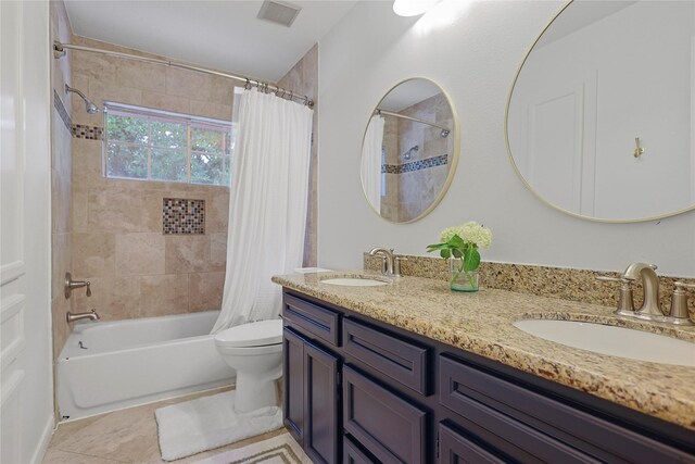 12915 Birch Falls Rd, Houston, TX 77065 - full bathroom featuring shower / bath combo, double vanity, toilet, and tile patterned flooring