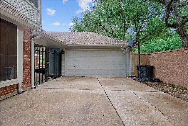 12915 Birch Falls Rd, Houston, TX 77065 - garage featuring fence and driveway