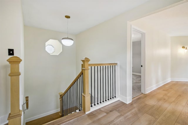 28 Stony Creek Dr, Conroe, TX 77384 - stairway featuring wood finished floors and baseboards