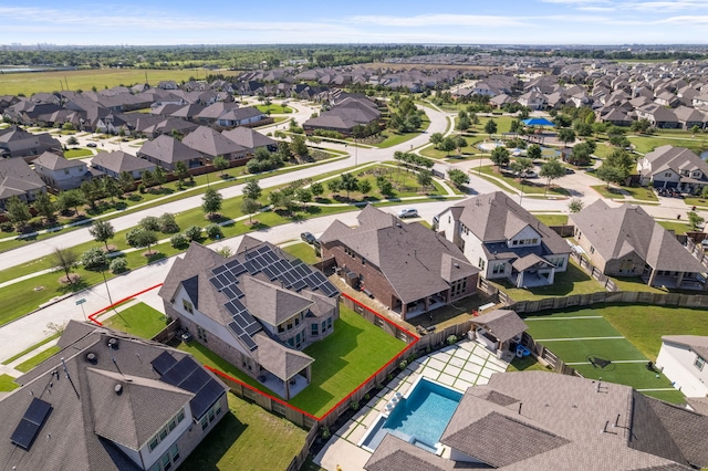aerial view of residential area featuring property parcel outlined and a pool area