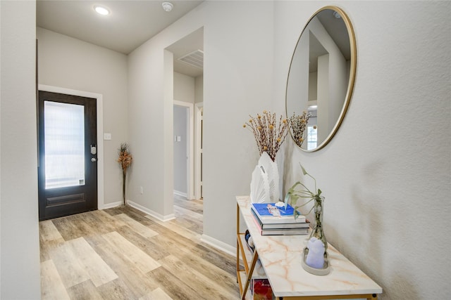 2815 Torrey Pines Dr, Fulshear, TX 77423 - entrance foyer featuring wood finished floors and baseboards