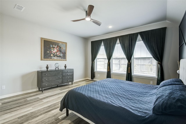 2815 Torrey Pines Dr, Fulshear, TX 77423 - bedroom featuring wood finished floors, baseboards, and a ceiling fan