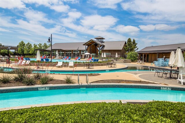 2815 Torrey Pines Dr, Fulshear, TX 77423 - community pool with a patio