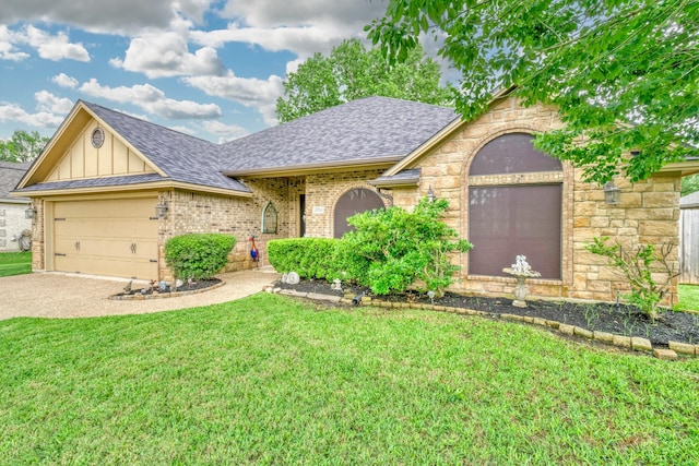 ranch-style house featuring a shingled roof, board and batten siding, an attached garage, and a front lawn