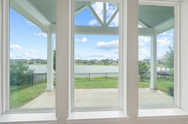 18127 Shoreline Vista Ln, Cypress, TX 77433 - doorway to outside featuring a water view and plenty of natural light