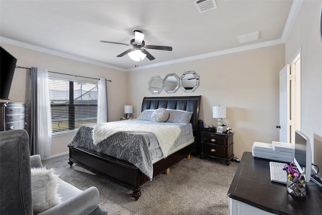 carpeted bedroom featuring ornamental molding and ceiling fan