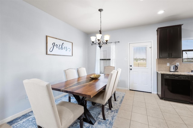 dining space with a chandelier, baseboards, light tile patterned floors, and recessed lighting