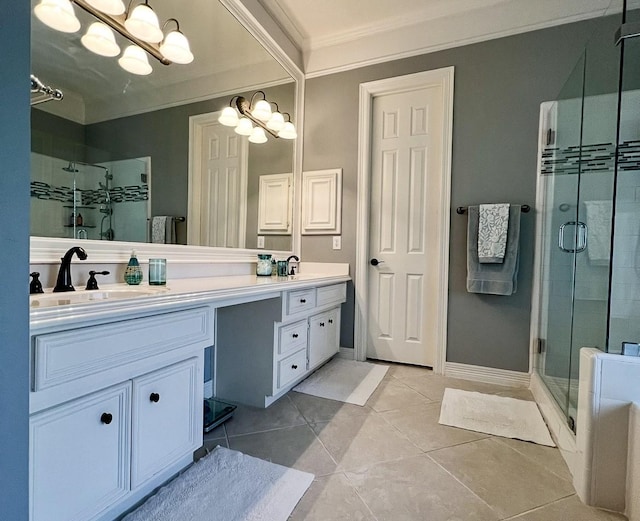 bathroom featuring double vanity, a stall shower, ornamental molding, tile patterned floors, and baseboards