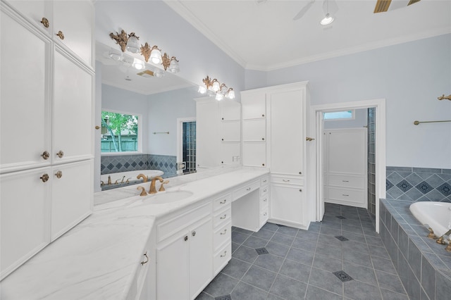 522 Rancho Bauer Dr, Houston, TX 77079 - bathroom featuring tile patterned floors, ornamental molding, a bath, and vanity