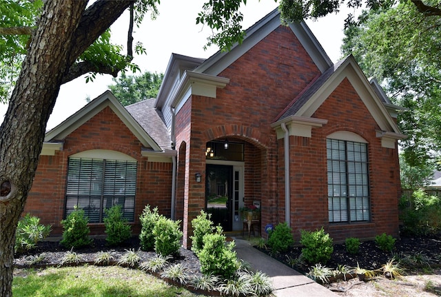 18411 Arrow Flint Cv, Houston, TX 77084 - view of front of home with brick siding and a shingled roof