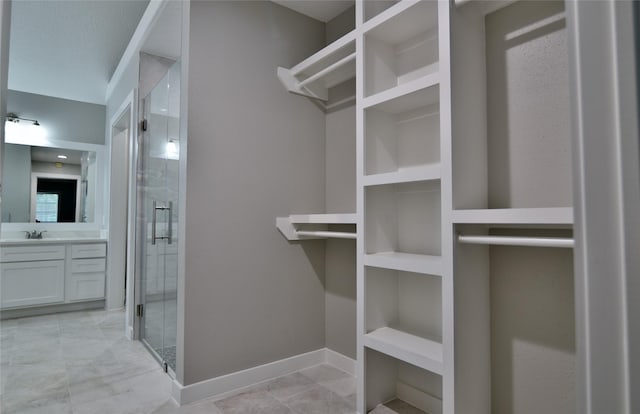 18411 Arrow Flint Cv, Houston, TX 77084 - spacious closet featuring a sink