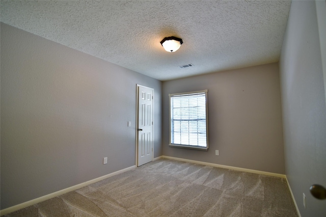 18411 Arrow Flint Cv, Houston, TX 77084 - carpeted empty room featuring a textured ceiling and baseboards