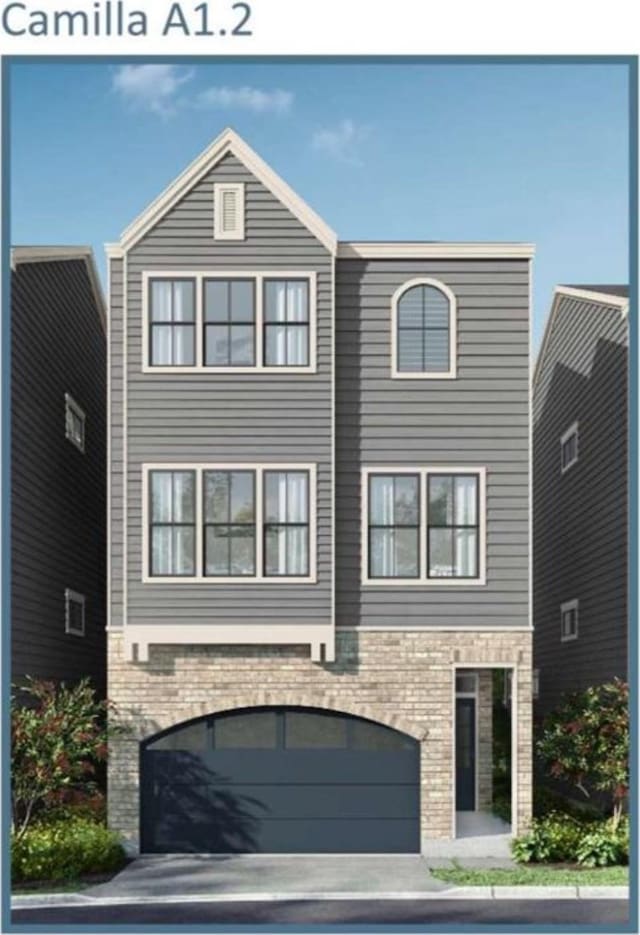 view of front of property featuring an attached garage