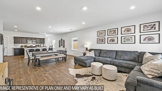 5427 Magnolia Heath Ln, Spring, TX 77373 - living area with dark wood-style flooring and recessed lighting