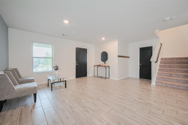 20864 Sheffield Park Dr, Porter, TX 77365 - living area with stairway, light wood-style flooring, recessed lighting, and baseboards