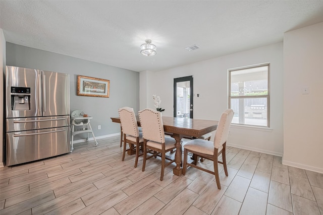 20864 Sheffield Park Dr, Porter, TX 77365 - dining room with wood finish floors and baseboards