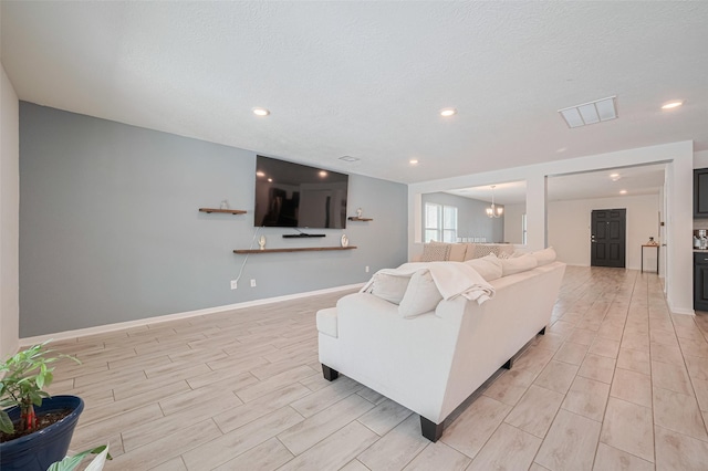 20864 Sheffield Park Dr, Porter, TX 77365 - living area featuring wood finish floors and recessed lighting