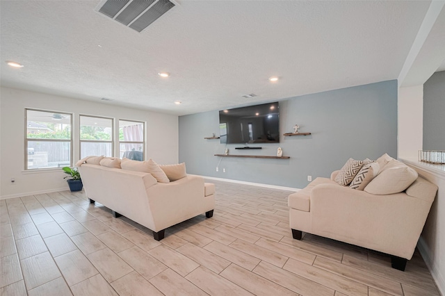 20864 Sheffield Park Dr, Porter, TX 77365 - living room with recessed lighting, baseboards, and wood finish floors
