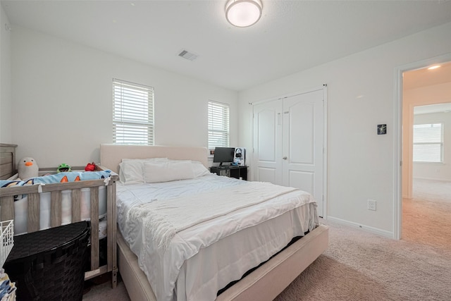 20864 Sheffield Park Dr, Porter, TX 77365 - bedroom featuring carpet, a closet, and baseboards