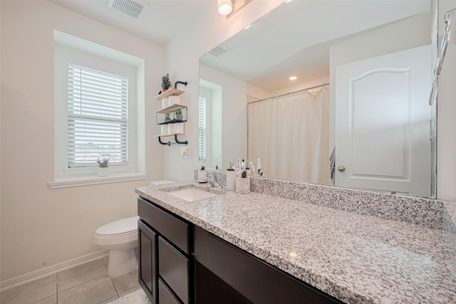 20864 Sheffield Park Dr, Porter, TX 77365 - full bath with vanity, toilet, baseboards, and tile patterned floors